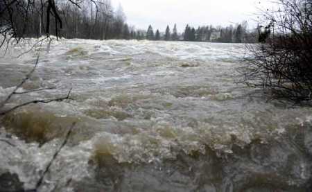 Flooding damages 50 buildings, makes 100 vulnerable