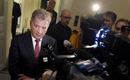 President Sauli Niinistö talked to reporters after a meeting with the government on Saturday following the Paris terrorist attacks. Photo – Lehtikuva.