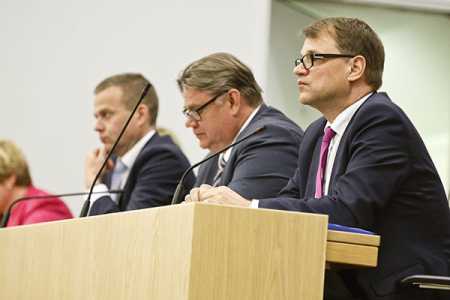 Leaders of the three-party alliance government.File Photo – Lehtikuva.