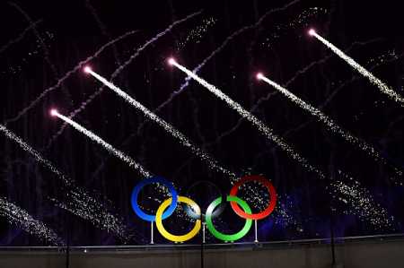 Rio opens Olympics with colors, curves and coolness